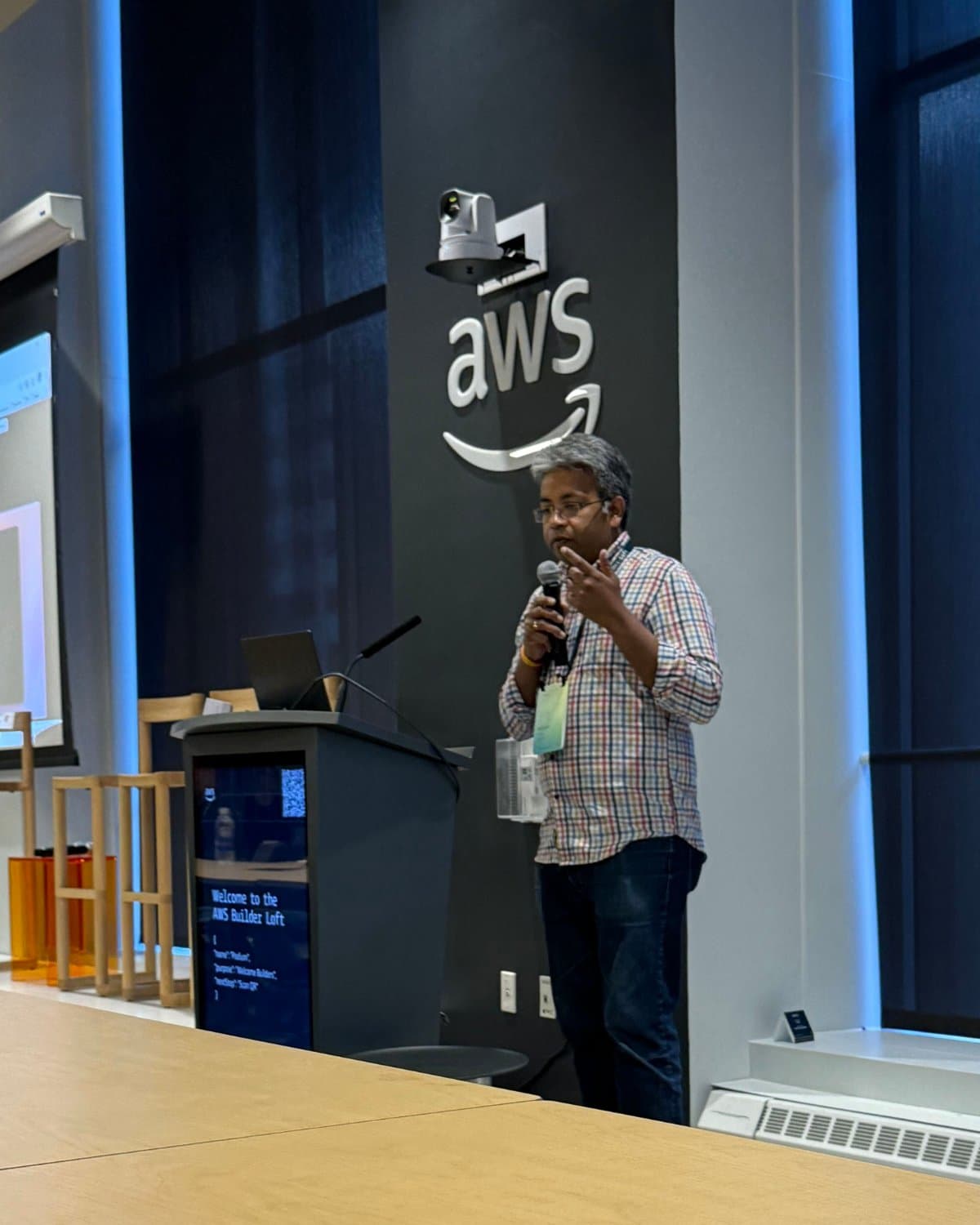 Speaker presenting at the Swytchcode AI agents event at the AWS Builder Loft